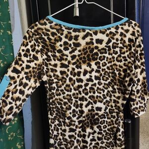 Rue 21 turquoise & cheetah print quarter sleeze